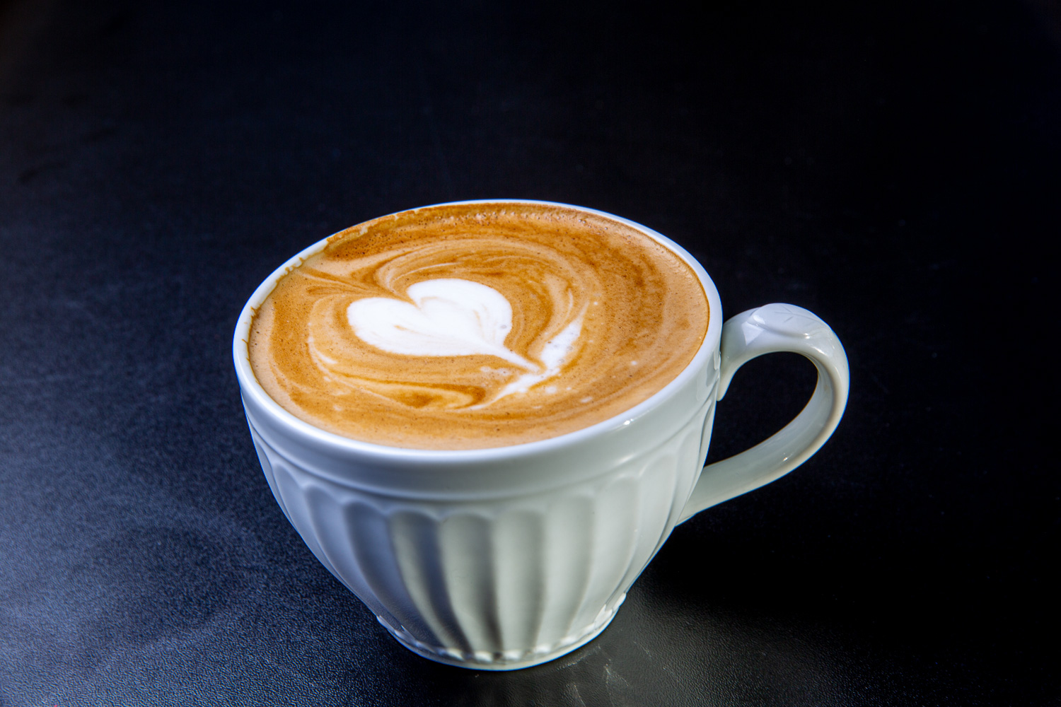 Cafe latte made with organic coffee at Jireh Cafe & Bakery restaurant in Montrose, Colorado